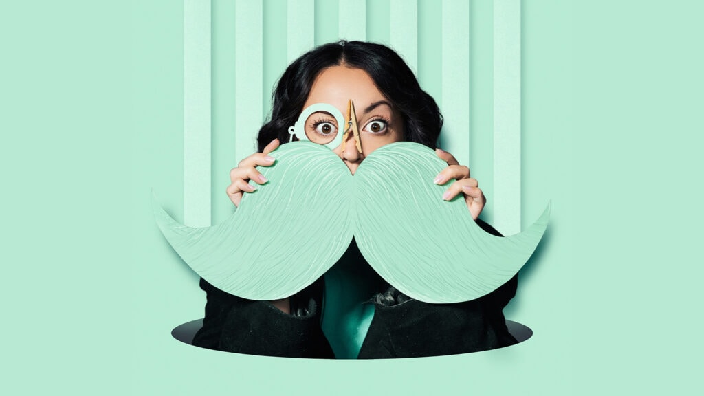 Artwork for ETO's The Great Sink, showing a woman holding a large light green moustache above her lip and a peg on her nose.